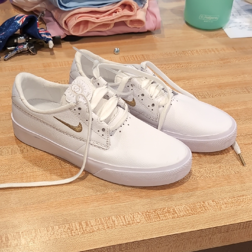Nike White and Gold Minimalist Sneakers